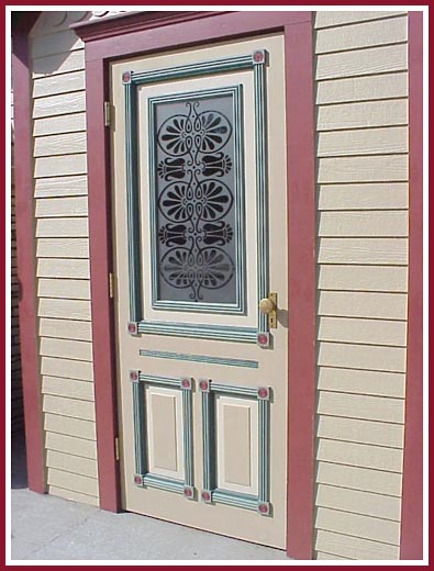 Etched window insert in a restored Victorian door