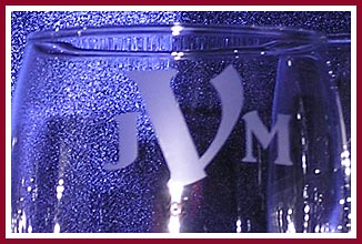 Detail of the monogram etched on wine glasses using Egress Etch stencils and supplies