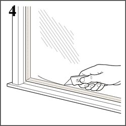 Remove masking tape on the glass with a razor knife.