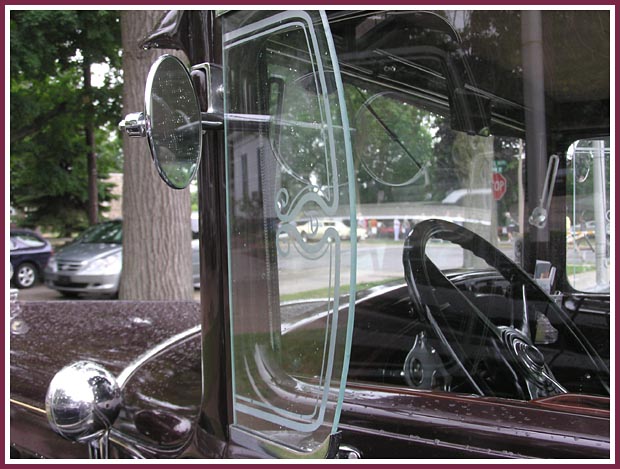 Vintage Model T Ford with decorative etched windscreen